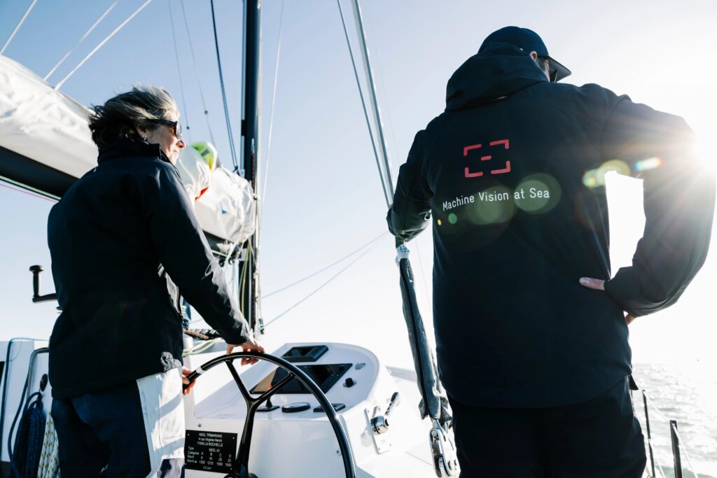 Two people on the boat testing SEA.AI Equipment